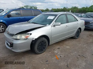 2004 Toyota Camry LE with VIN 4T1BE32K84U374943, listed as a IAAI auction lot 42038382 with 323,419 mi miles. Bid and sale history available at carsss.com. Image 2.
