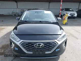 2021 Hyundai Ioniq SE with VIN KMHC65LD3MU249765, listed as a IAAI auction lot 41986977 with 63,363 mi miles and . Bid and sale history available at DreamBid. Image 13.
