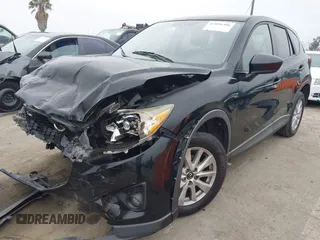 2014 Mazda CX-5 Touring z VIN JM3KE2CY3E0355332, wystawiony jako IAAI lot #42096306 z przebiegiem 108 198 mil mil oraz . Historia ofert i sprzedaży dostępna na DreamBid. Obrazek 20.