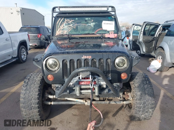 2009 Jeep Wrangler Unlimited Rubicon z VIN 1J4GA69159L749215, wystawiony jako IAAI lot #41489893 z przebiegiem 177 768 mil mil oraz . Historia ofert i sprzedaży dostępna na DreamBid. Obrazek 12.