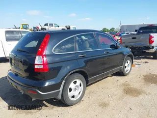 2008 Honda CR-V LX with VIN 3CZRE38368G704276, listed as a IAAI auction lot 42039149 with 114,325 mi miles and . Bid and sale history available at carsss.com. Image 4.
