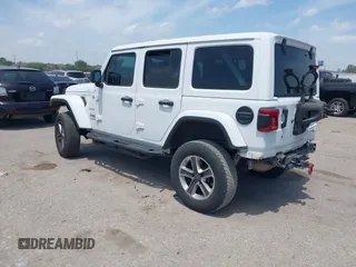 2018 Jeep Wrangler Unlimited Sahara z VIN 1C4HJXEG0JW245118, wystawiony jako IAAI lot #42066614 z przebiegiem 83 743 mil mil oraz . Historia ofert i sprzedaży dostępna na DreamBid. Obrazek 3.