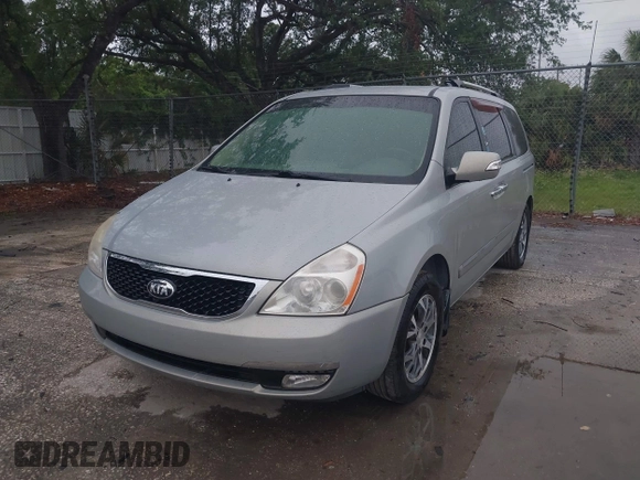 2014 Kia Sedona EX with VIN KNDMH4C74E6578326, listed as a IAAI auction lot 41990311 with 220,772 mi miles. Bid and sale history available at carsss.com. Image 2.