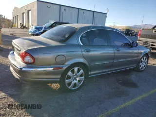 2004 Jaguar X-Type with VIN SAJEA51C74WD70684, listed as a Copart auction lot 46536395 with 155,184 mi miles and Salvage Title. Bid and sale history available at carsss.com. Image 3.
