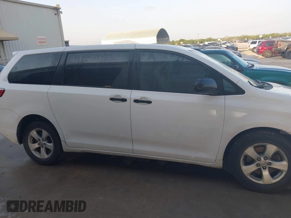 2015 Toyota Sienna L with VIN 5TDZK3DC5FS657115, listed as a IAAI auction lot 42109678 with 176,995 mi miles. Bid and sale history available at carsss.com. Image 13.