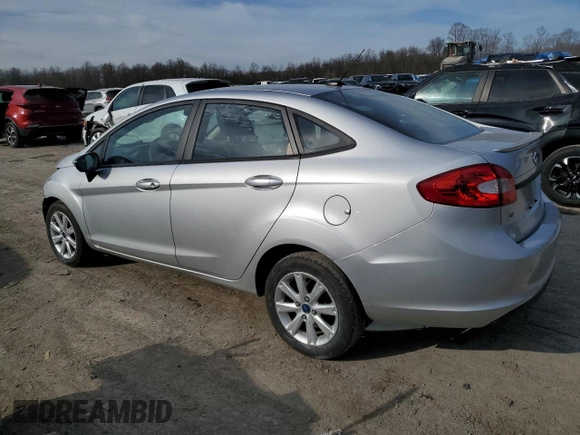 2012 Ford Fiesta SE with VIN 3FADP4BJ9CM121045, listed as a Copart auction lot 47297575 with 83,785 mi miles and Salvage Title. Bid and sale history available at DreamBid. Image 2.