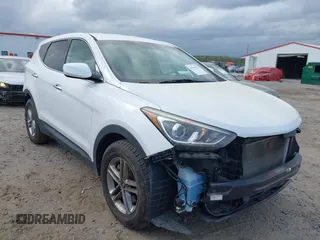 2018 Hyundai Santa Fe 2.4L z VIN 5NMZTDLB9JH060895, wystawiony jako IAAI lot #41939221 z przebiegiem 89 960 mil mil oraz . Historia ofert i sprzedaży dostępna na DreamBid. Obrazek 1.