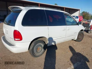 1999 Dodge Caravan SE with VIN 2B4GP45G0XR312100, listed as a IAAI auction lot 40966771 with 233,188 mi miles and . Bid and sale history available at carsss.com. Image 4.