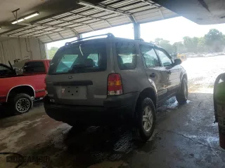2007 Ford Escape XLS with VIN 1FMCU02Z47KA50729, listed as a Copart auction lot 62275934 with 304,945 mi miles and Salvage Title. Bid and sale history available at carsss.com. Image 3.