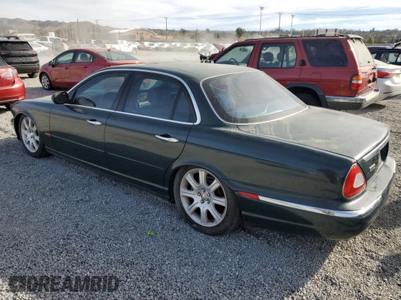 2004 Jaguar XJ with VIN SAJWA71C34SG29498, listed as a Copart auction lot 42653715 with 116,956 mi miles and Salvage Title. Bid and sale history available at carsss.com. Image 2.