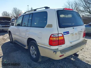 2000 Toyota Land Cruiser with VIN JT3HT05J5Y0126396, listed as a IAAI auction lot 41986185 with 201,156 mi miles. Bid and sale history available at carsss.com. Image 3.