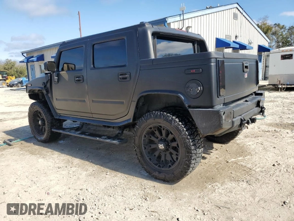 2006 Hummer H2 with VIN 5GRGN22U66H103993, listed as a Copart auction lot 43973375 with 145,565 mi miles and Salvage Title. Bid and sale history available at carsss.com. Image 2.