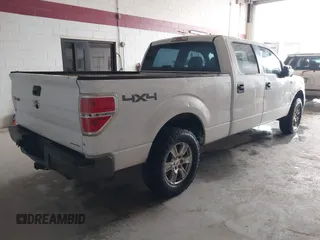 2014 Ford F-150 XL with VIN 1FTFW1EF5EKE45762, listed as a IAAI auction lot 41762773 with 203,423 mi miles. Bid and sale history available at carsss.com. Image 4.