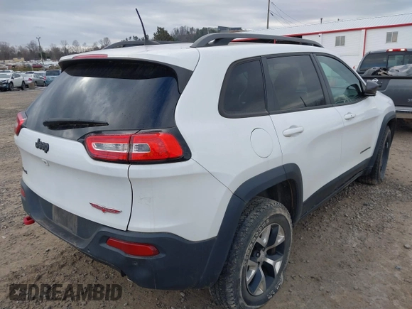2017 Jeep Cherokee Trailhawk z VIN 1C4PJMBS4HW647835, wystawiony jako IAAI lot #41375077 z przebiegiem 87 208 mil mil oraz . Historia ofert i sprzedaży dostępna na DreamBid. Obrazek 4.