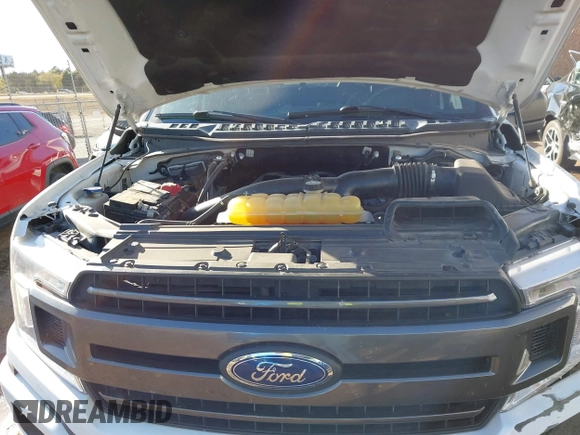 2018 Ford F-150 XL with VIN 1FTEW1EG1JKE29623, listed as a IAAI auction lot 40615703 with 122,846 mi miles and . Bid and sale history available at DreamBid. Image 10.