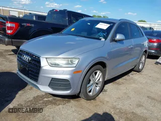 2017 Audi Q3 Premium with VIN WA1ECCFSXHR002623, listed as a IAAI auction lot 42077132 with 118,511 mi miles and . Bid and sale history available at DreamBid. Image 18.