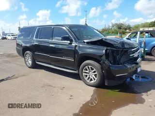 2016 Chevrolet Suburban LT with VIN 1GNSCHKC5GR288312, listed as a IAAI auction lot 41681664 with 195,619 mi miles and . Bid and sale history available at DreamBid. Image 1.