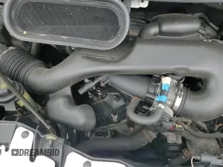 2018 Ford Transit z VIN 1FTYR1ZM2JKB52288, wystawiony jako Copart lot #58154535 z przebiegiem 109 620 mil mil oraz Szkoda całkowita • Salvage title. Historia ofert i sprzedaży dostępna na DreamBid. Obrazek 17.