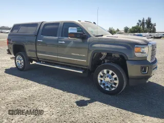 2018 GMC Sierra 2500HD Denali z VIN 1GT12UEY6JF101420, wystawiony jako Copart lot #55831995 z przebiegiem 17 288 mil mil oraz Czysty tytuł • Clean title. Historia ofert i sprzedaży dostępna na DreamBid. Obrazek 4.