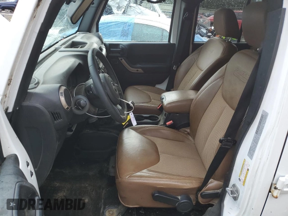 2016 Jeep Wrangler Unlimited Sahara with VIN 1C4BJWEGXGL245041, listed as a Copart auction lot 88099245 with 134,768 mi miles and Salvage title. Bid and sale history available at DreamBid. Image 7.