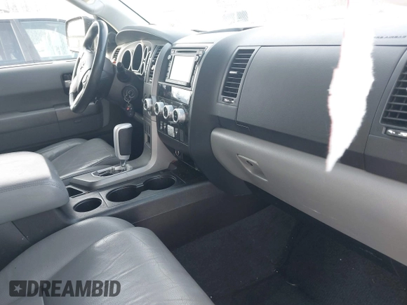 2016 Toyota Sequoia Limited with VIN 5TDJY5G1XGS127354, listed as a IAAI auction lot 41291303 with 106,327 mi miles. Bid and sale history available at carsss.com. Image 5.