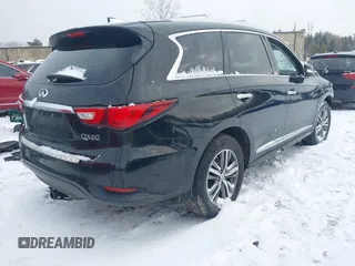 2016 Infiniti QX60 with VIN 5N1AL0MM9GC530142, listed as a IAAI auction lot 40989376 with 116,782 mi miles and . Bid and sale history available at DreamBid. Image 4.