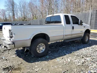 2000 Ford Super Duty F-250 XL with VIN 1FTNX21F4YED40038, listed as a Copart auction lot 49989245 with 248,586 mi miles and Salvage Title. Bid and sale history available at carsss.com. Image 3.