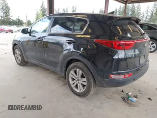 2018 Kia Sportage LX with VIN KNDPM3AC7J7463078, listed as a IAAI auction lot 42086356 with 75,406 mi miles and . Bid and sale history available at carsss.com. Image 3.