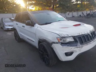 2014 Jeep Grand Cherokee Limited z VIN 1C4RJFBG7EC265327, wystawiony jako IAAI lot #40572818 z przebiegiem 142 087 mil mil oraz . Historia ofert i sprzedaży dostępna na DreamBid. Obrazek 1.