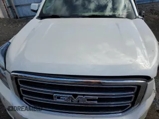 2015 GMC Yukon SLT with VIN 1GKS2BKC3FR143491, listed as a Copart auction lot 76062044 with Not Provided miles and Salvage Title. Bid and sale history available at carsss.com. Image 12.