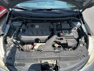 2009 Nissan Versa S with VIN 3N1BC13E19L499018, listed as a Copart auction lot 56711385 with 196,451 mi miles and Clean Title. Bid and sale history available at DreamBid. Image 7.