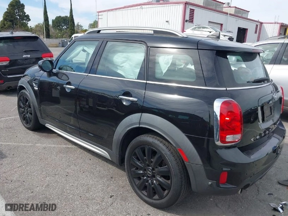 2020 MINI Countryman Cooper with VIN WMZYW3C04L3M24637, listed as a IAAI auction lot 41677154 with 34,786 mi miles. Bid and sale history available at carsss.com. Image 14.