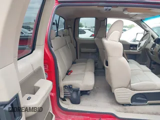 2006 Ford F-150 STX with VIN 1FTRX12W16NB08665, listed as a IAAI auction lot 41910402 with 170,392 mi miles. Bid and sale history available at carsss.com. Image 8.