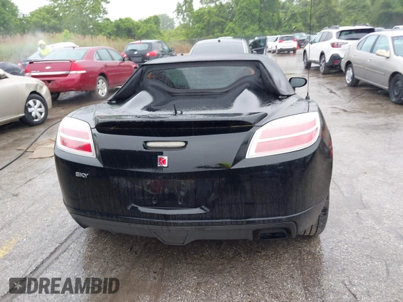 2009 Saturn Sky z VIN 1G8MN35B59Y104152, wystawiony jako IAAI lot #42308236 z przebiegiem 190 823 mil mil oraz . Historia ofert i sprzedaży dostępna na DreamBid. Obrazek 16.