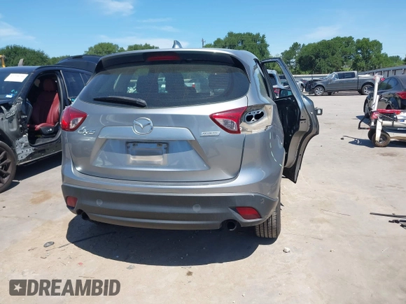 2014 Mazda CX-5 Sport with VIN JM3KE2BE7E0371203, listed as a IAAI auction lot 42243756 with 121,534 mi miles and . Bid and sale history available at DreamBid. Image 17.