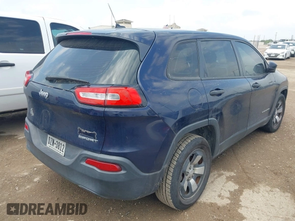 2014 Jeep Cherokee Sport with VIN 1C4PJLAB2EW279808, listed as a IAAI auction lot 42202402 with 98,671 mi miles and . Bid and sale history available at DreamBid. Image 4.