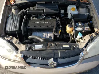2008 Suzuki Forenza z VIN KL5JD56Z88K306719, wystawiony jako Copart lot #81759734 z przebiegiem 58 759 mil mil oraz Tytuł czysty. Historia ofert i sprzedaży dostępna na DreamBid. Obrazek 11.
