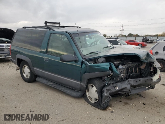1998 Chevrolet Tahoe z VIN 3GNEK18R4WG128424, wystawiony jako Copart lot #79684984 z przebiegiem 217 456 mil mil oraz Szkoda całkowita • Salvage title. Historia ofert i sprzedaży dostępna na DreamBid. Obrazek 4.