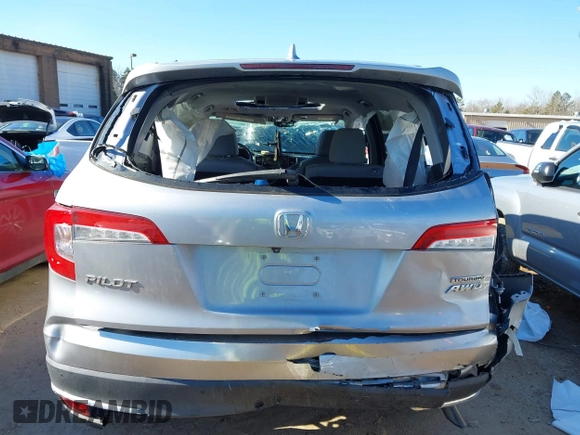 2019 Honda Pilot Touring 7-Passenger with VIN 5FNYF6H60KB038846, listed as a IAAI auction lot 41339385 with Not provided miles and . Bid and sale history available at DreamBid. Image 16.