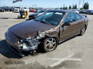 2000 Acura Integra LS with VIN JH4DC4453YS014754, listed as a Copart auction lot 61295265 with 135,573 mi miles and Salvage title. Bid and sale history available at DreamBid. Image 1.