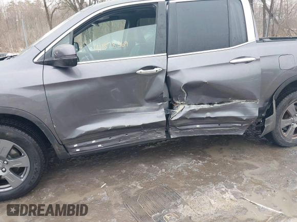 2020 Honda Ridgeline RTL-E with VIN 5FPYK3F70LB015422, listed as a IAAI auction lot 41578369 with 78,860 mi miles and . Bid and sale history available at DreamBid. Image 6.