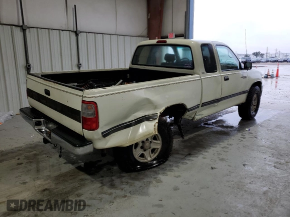 1997 Toyota T100 SR5 with VIN JT4UN24D9V0048079, listed as a Copart auction lot 87042344 with 303,785 mi miles and Salvage Title. Bid and sale history available at DreamBid. Image 3.