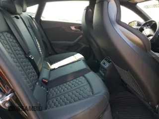 2023 Audi RS 5 Sportback z VIN WUAAWCF54PA900981, wystawiony jako Copart lot #62860383 z przebiegiem 4779 mil mil oraz . Historia ofert i sprzedaży dostępna na DreamBid. Obrazek 10.