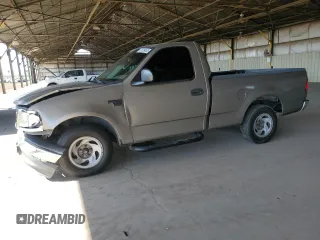 2002 Ford F-150 XL with VIN 1FTRF17WX2NB56672, listed as a Copart auction lot 57639465 with 138,696 mi miles and Salvage title. Bid and sale history available at DreamBid. Image 1.