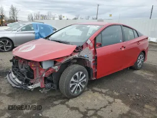 2021 Toyota Prius LE z VIN JTDKAMFP9M3189379, wystawiony jako Copart lot #48824235 z przebiegiem 27 154 mil mil oraz Szkoda całkowita • Salvage title. Historia ofert i sprzedaży dostępna na DreamBid. Obrazek 1.