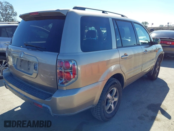 2006 Honda Pilot EX with VIN 5FNYF28416B017534, listed as a IAAI auction lot 41656789 with 241,343 mi miles and . Bid and sale history available at DreamBid. Image 4.