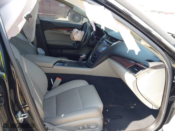 2016 Cadillac CTS Sedan RWD with VIN 1G6AP5SX5G0194397, listed as a IAAI auction lot 41791898 with 77,809 mi miles. Bid and sale history available at carsss.com. Image 5.