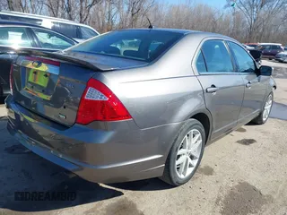 2010 Ford Fusion SEL with VIN 3FAHP0JGXAR219839, listed as a IAAI auction lot 41837474 with 143,445 mi miles. Bid and sale history available at carsss.com. Image 4.