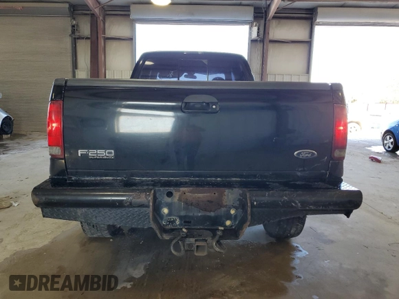 1999 Ford F-350 XL z VIN 1FTSW31S9XED72877, wystawiony jako Copart lot #77412084 z przebiegiem 449 967 mil mil oraz Szkoda całkowita • Salvage title. Historia ofert i sprzedaży dostępna na DreamBid. Obrazek 6.