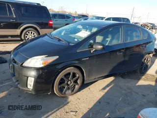 2011 Toyota Prius I with VIN JTDKN3DUXB0293692, listed as a IAAI auction lot 41628333 with 124,577 mi miles. Bid and sale history available at carsss.com. Image 2.